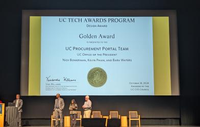 Renea Davis-Leathers accepts UC Tech Golden Award at UC Tech event on October 29, 2024