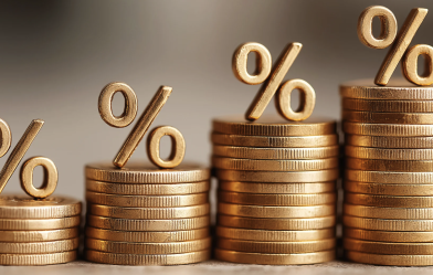 Coins stacked up with percentage signs