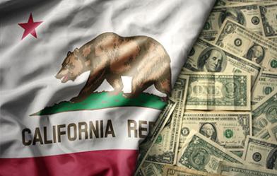 the CA state flag next to a pile of US dollars