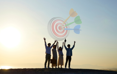 People celebrating surpassing a targeted goal