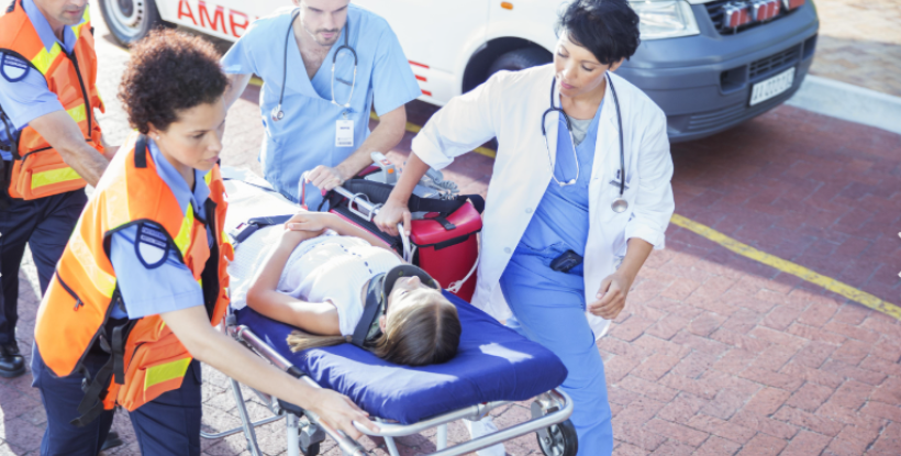 Emergency first responders rush patient to medical care