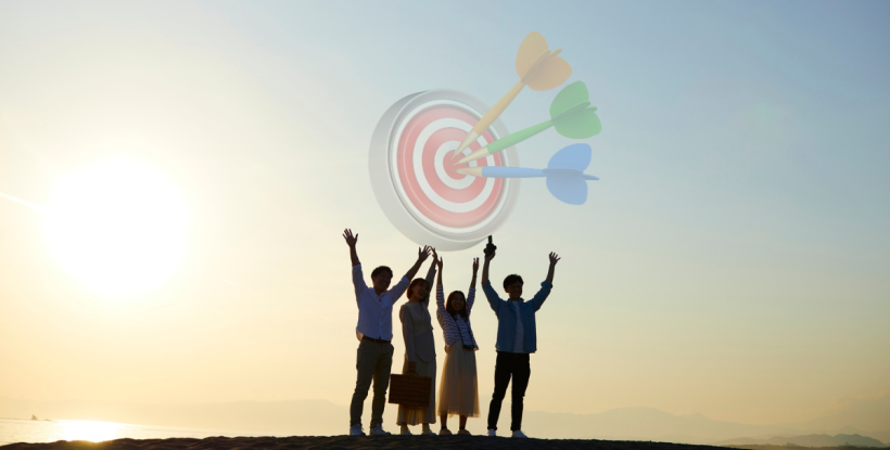 People celebrating surpassing a targeted goal
