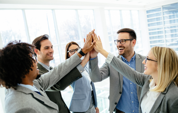 office workers high-fiving