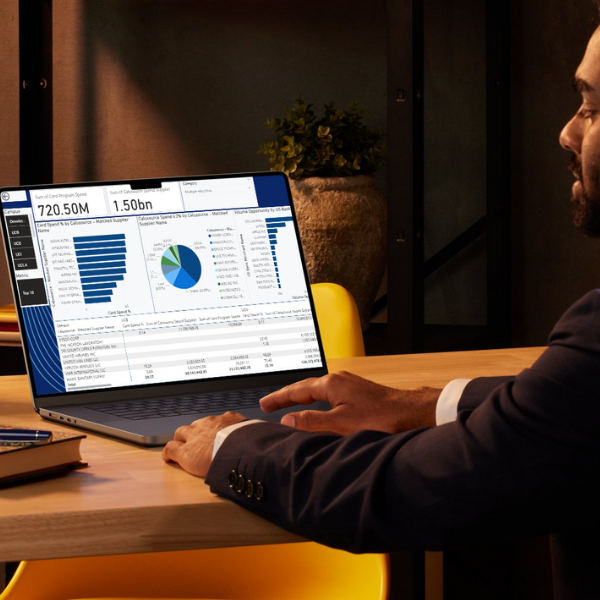 man using his laptop to edit a dashboard