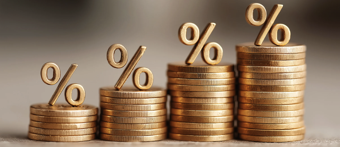 Coins stacked up with percentage signs