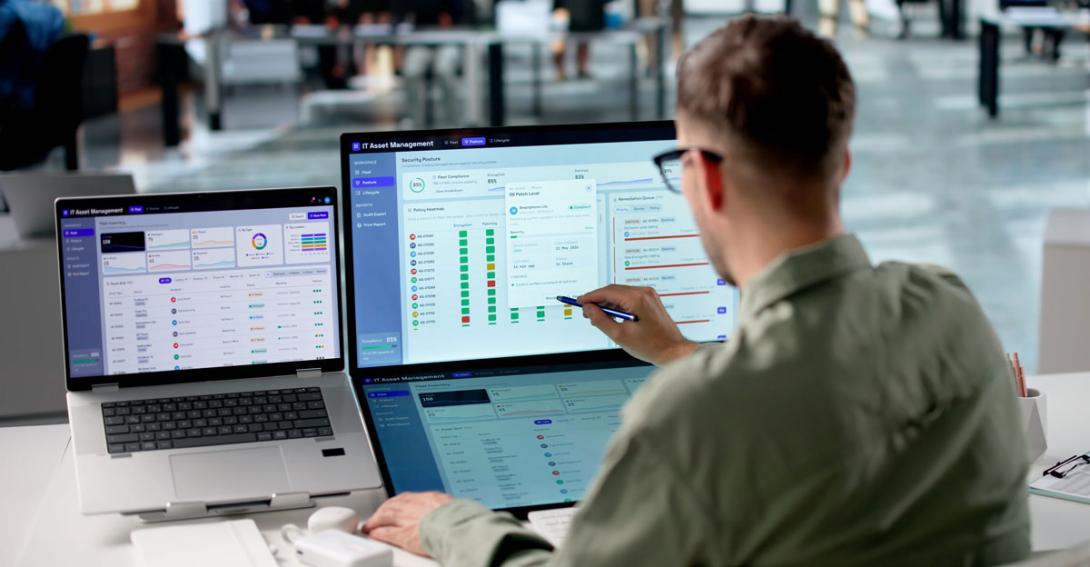 Young IT Manager Reviews Asset Inventory